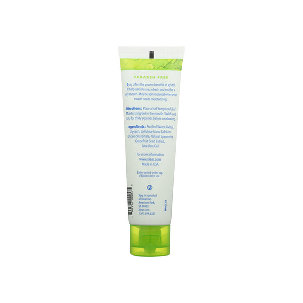 Green and white tube of a toothpaste on a white background