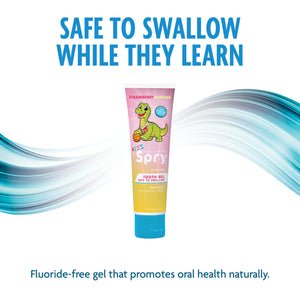 Children's tooth gel tube with dinosaur design on a white background