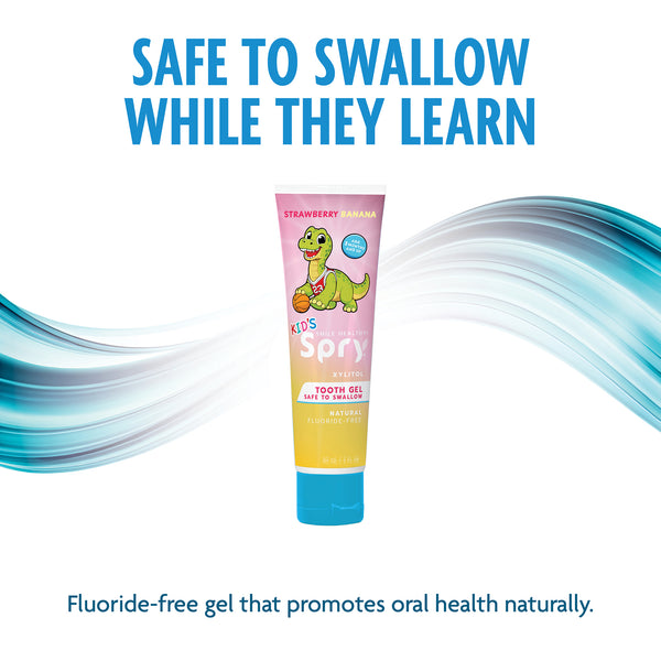 Children's tooth gel tube with dinosaur design on a white background